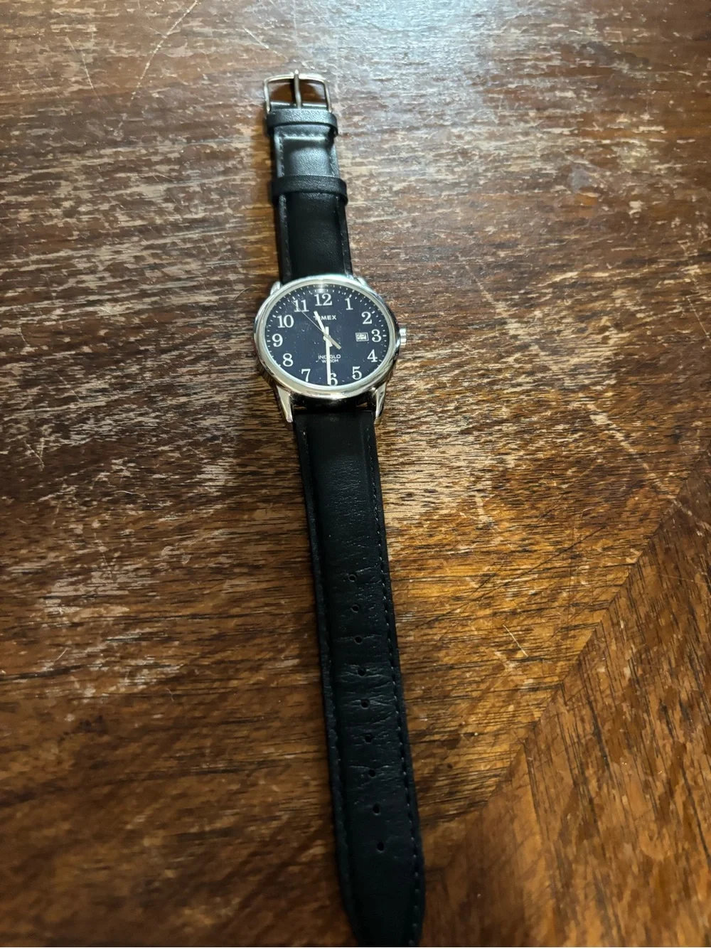 Timex reader Men’s Black Dial Silver Case Leather Strap Watch